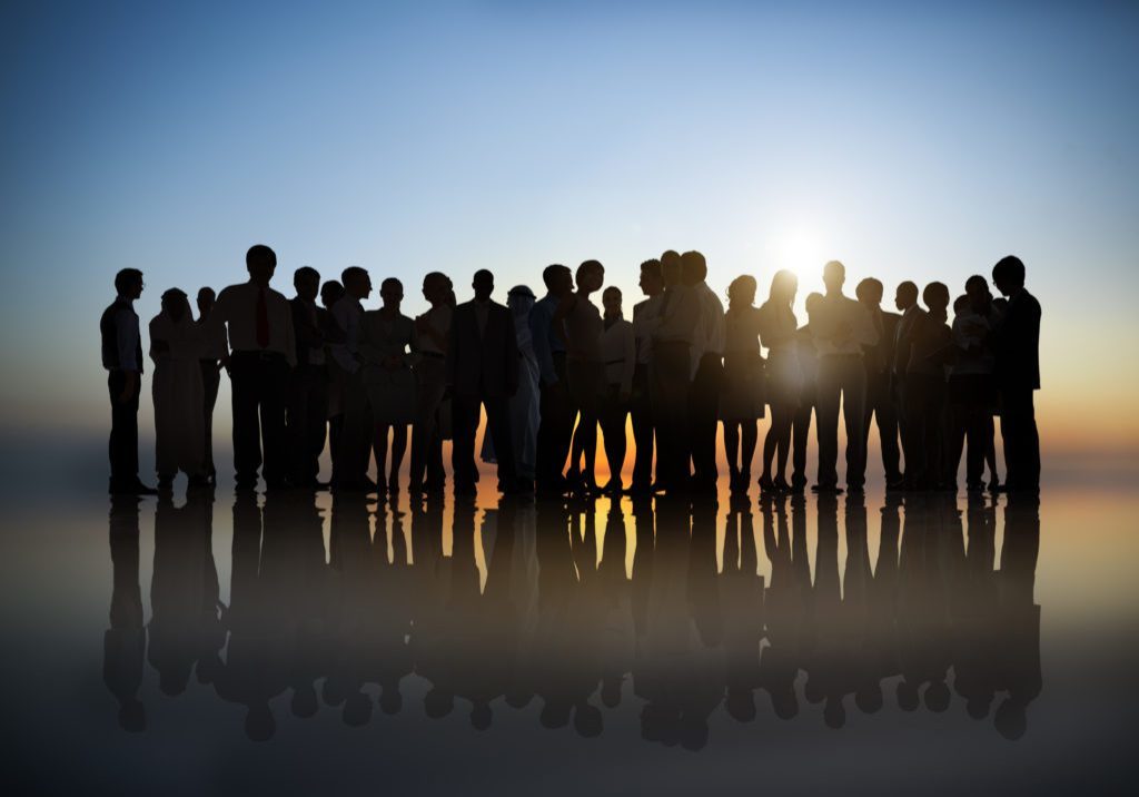 Silhouette of Large Group of Business People at Sunset